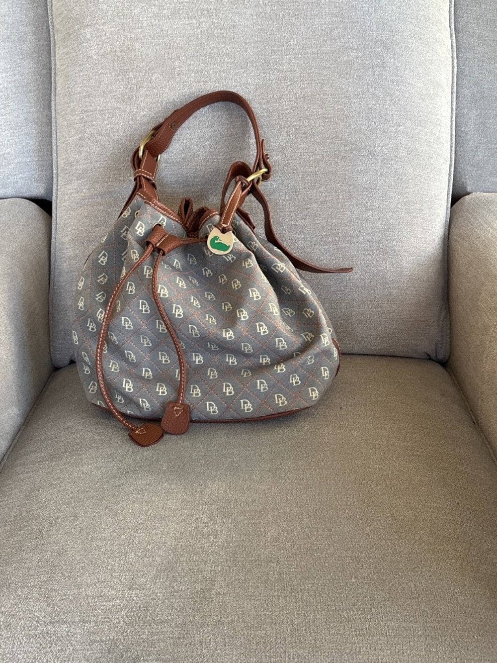vintage Dooney & Bourke signature monogram canvas drawstring bucket handbag